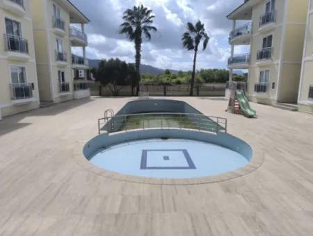 3 1 Apartment With Pool For Sale In Dalaman Center